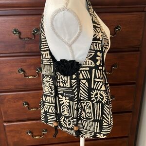 Mailelani’s Kauai, Hawaiian shoulder bag with cinch closure.